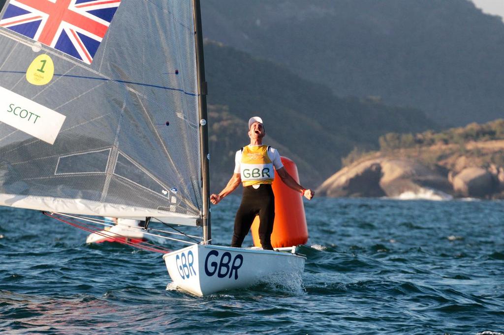 Day 7 - Finn August 14, 2016. Giles Scott celebrates his Gold Medal win in the Finn class © Richard Gladwell www.photosport.co.nz